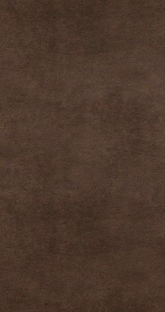 a brown area rug with no pattern on the top and bottom part of the rug