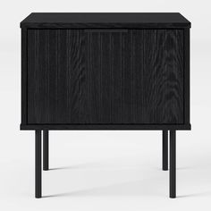 a black wooden cabinet with two legs