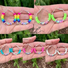 four pairs of colorful beaded hoop earrings are shown in the palm of a person's hand