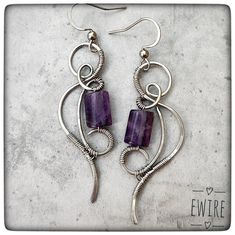 "The jewelry is delivered by Fedex, the delivery time is 3-4 working days! I bent these earrings from stainless steel wire. The wire type is 316L surgical metal wire. I decorated it with a 10 mm amethyste gemstone beads. The lever back closure is stainless steel, but not 316L. The high-gloss steel wire I use is a great alternative to silver wire.  It has a deeper gray color than silver.  However, this color is hereditary, does not change.  It does not oxidize, blacken, or discolor.  It gives a very stable jewelry shape.       Parameters: Total height appr.: 6 cm.(2.2\") I will send the jewel in bubble wrap or in a small box. You can find more earrings from me here: https://www.etsy.com/shop/EWirehu?ref=search_shop_redirect&section_id=28201898 Thank you for your visit!" Ear Wire Earrings, Unique Nickel-free Wire Earrings, Wire Wrapped Wrap Earrings As A Gift, Nickel-free Wire Wrap Earrings Gift, Silver-plated Wire Wrapped Earrings As Gift, Silver Dangle Wire Earrings, Silver Plated Wire Wrapped Wrap Earrings As Gift, Pierced Dangle Earrings With Wire, Silver Bohemian Wire Earrings