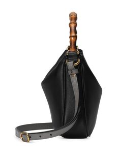 small Diana leather shoulder bag from Gucci featuring black, calf leather, gold-tone hardware, signature Double G logo, concealed magnetic fastening, two adjustable detachable shoulder straps, signature bamboo top handle, main compartment and internal zip-fastening pocket. This item is in size UNI and the color is Black Gucci Calf Leather Satchel Shoulder Bag, Gucci Calf Leather Shoulder Bag, Gucci Calf Leather Travel Shoulder Bag, Gucci Calf Leather Shoulder Bag For Travel, Gucci Top Handle Shoulder Bag With Leather Handles, Gucci Leather Top Handle Shoulder Bag, Gucci Black Leather Shoulder Bag, Black Gucci Leather Shoulder Bag, Black Leather Gucci Shoulder Bag