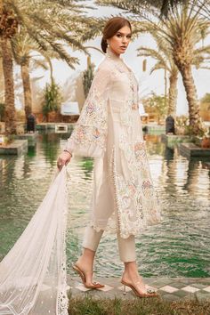 Brand: Maria.BProduct Code: D-2405-ACollection: Maria.B Unstitched Embroidered Luxury Lawn CollectionFabric: Lawn DESIGN DETAILS: ShirtEmbroidered Organza Neck PattiEmbroidered Organza Center Panel With Printed Lawn AppliqueEmbroidered Organza Side Panels With Printed Lawn Applique Left & RightEmbroidered Organza Sleeves With Printed Lawn Applique Left & RightEmbroidered Organza Sleeves PattiDyed Organza Back UndershirtDyed Lawn Undershirt DupattaEmbroidered Net DupattaEmbroidered Organza Dupatta Patti TrousersDyed Cambric TrouserColor: Off White CARE INSTRUCTIONS: Extra Fabric Has Been Used For Shoot Original Color May Vary Slightly From The Picture Dry Clean Recommended Iron The Clothes At Moderate Temperature Do Not Use Bleach, Or Stain Removing Chemicals Damp Fabric Should Not Be Expos Maria B Lawn, Designer Suits Online, Pakistani Boutique, Pakistani Designer Clothes, Lawn Design, Pakistani Designer Suits, Organza Sleeves, Pakistani Lawn Suits, Maria B