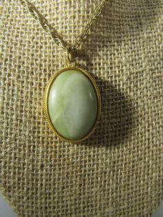 nice stone necklace green stone Vintage Oval Jade Necklace, Vintage Oval Large Stone Necklaces, Vintage Oval Necklace With Large Stone, Vintage Oval Large Stone Necklace, Oval Large Stone Vintage Necklace, Vintage Jade Necklace With Natural Stones, Handmade Vintage Green Turquoise Necklace, Green Necklaces With Large Stone Round Pendant, Green Necklaces With Large Round Stone Pendant