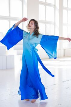 Satin kimono dress with color transitions in shades of blueLight and airy"Wings" sewn into the sleeves, which complement the airy image of the dress➤ Features> dress length: 58,5 inches / 148cm cm  ➤ SizingMy Size Guide in FAQ section below will help you define the perfect size match. The item can also be made according to your measurements – just message them to me. ➤ DeliveryYour item is made-to-order and will be ready within 2-7 days. Average delivery times:> North America: up to 1-2 we Blue Maxi Dress With Kimono Sleeves For Beach, Blue Maxi Length Kimono For Beach, Blue Beach Robe For Summer, Blue Wrap Dress For Summer, Blue Wrap Kimono For Summer, Blue Robe With Kimono Sleeves For Summer, Spring Blue Maxi Dress With Kimono Sleeves, Blue Wrap Maxi Dress For Summer, Blue Wrap Maxi Dress For Spring