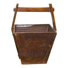 an old wooden bucket with handle on a white background for use as a planter