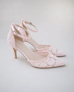 "Crochet Lace Wedding Collection. Vintage inspired pointed toe crochet lace with mini pearls all around. The delicate mini pearl beads are placed carefully by hand to create a graceful classic bridal shoe. Available in 3 colors. DETAILS: HEELS: 3 inches COLORS AVAILABLE: Dusty Pink, Ivory, and White UPPER: Synthetic upper and lining MATERIALS: Manmade outsole ORIGIN:  Imported STYLE NAME: EVA Not sure of which size to purchase? Shoes measurements are as follow: (Please note measurements taken the length of inside of shoe from toe to heel). Size 5 - 9.5\" Size 6 - 9.875\" Size 7 - 10.125\" Size 8 - 10.375\" Size 9 - 10.75\" Size 10 - 11.125\" Size 11 - 11.375\" Please note all these infos are intended for general reference and are to be used as a guide only. Age and size will vary. Measurem Luxury Pink Wedding Shoes With Round Toe, Luxury Pink Court Shoes With Sculpted Heel, Shoe With Light Pink Dress Bridesmaid, Cheap Pink Slip-on Heels, Cheap Pink Closed Toe Heels, Cheap Feminine Party Heels, Cheap Cute Pink Heels, Luxury Pink Round Toe Wedding Shoes, Quince Shoes Small Heel