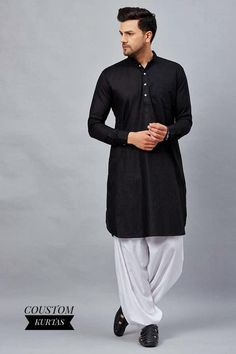 Classic Black Men's Shalwar Kameez | Elegant and Timeless Men's Black Shalwar Kameez Traditional Wear Premium Elegant Shalwar Kameez | Black Kurta in White Salwar for Men | New Stylish Kurta Shalwar The kameez features a tailored fit with a straight cut, enhancing the traditional look while offering a contemporary silhouette. The shalwar provides a comfortable, relaxed fit, allowing ease of movement throughout the day. Whether you're attending a wedding, a cultural event, or simply want to embra Black Kurta Pajama Men With Jacket, Navratri Cotton Bandhgala, Cotton Bandhgala With Dabka For Navratri, Black Long Sleeve Sherwani For Navratri, Eid Cotton Kurta With Naqshi Embroidery, Traditional Black Cotton Bandhgala, Cotton Traditional Wear With Naqshi For Navratri, Cotton Salwar Kameez With Naqshi For Navratri, Traditional Black Cotton Sherwani