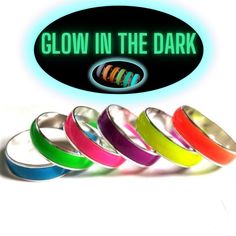 Glow in the dark rings are back! Super bright colours in the day and super bright glowing in the dark. Ideal for party-nightclubs-festivals or just a bit of fun!. Makes a great unique gift for birthdays-anniversaries -valentines-Christmas or just a treat for yourself!  Simply wear the ring all day and when it gets dark watch it GLOW! 0r if you want an even brighter glow hold a light over the ring for a few seconds to get a boost in the dark (The touch light on any mobile phone works great) Alway Colourful Rings, Glow Ring, Glowing In The Dark, Dark Rings, Nightclub Party, Three Rings, Ring Bag, Rave Festival, Bright Colours