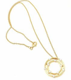 About This Piece: The Roberto Coin 18k Yellow Gold Double Hoop Diamond Pendant Necklace features two interlocking hoops, crafted from luxurious 18k yellow gold. Both hoops are adorned with sparkling pavé diamonds, creating an elegant contrast with the sleek gold. This sophisticated design exudes timeless elegance and contemporary flair, perfect for any occasion. More About the Piece:Retail: $6395.00 Metal: 18k Yellow Gold Necklace Length:Pendant: 15.5''22mm Weight: 7.9 g Stones: .72 ctw in diamo Roberto Coin Jewelry, Chanel Ring, Vintage Designer Jewelry, Hermes Jewelry, Jewelry Brands, Roberto Coin, Diamond Pendant Necklace, Jewelry Creation, Estate Jewelry