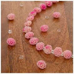 Strand Length: 7" Smallest Bead Dimensions: 2mm x 3.8mm Largest Bead Dimensions: 6mm x 10.9mm Approximate Hole Size: 1.291mm Material: Stone Shape: Novelty Finish: Glossy Color: Pink & Rose Age Grade: 16+ Quantity: 1 Strand Upgrade and personalize your jewelry crafts with a Pink Flower Dyed Stone Bead Strand. This strand features stone beads with an intricate flower shape, dyed in rich hues of pink and rose. Use them to customize a charming bracelet for yourself, friends, and family. Complementi Pink Flower Shaped Beaded Jewelry, Pink Multi-strand Beads For Jewelry Making, Elegant Flower-shaped Colorful Beads Jewelry, Pink Flower-shaped Stretch Bracelet With Colorful Beads, Pink Flower-shaped Jewelry With Colorful Beads, Semi Precious Beads, Frame Crafts, Bead Strand, Yarn Needle