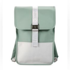 a mint green and white backpack with silver buckles on the front, side view