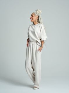 Athleisure Tracksuit With Ribbed Cuffs For Loungewear, Oversized Athleisure Activewear, Relaxed Fit Activewear With Ribbed Waistband For Lounging, Oversized Athleisure Activewear For Loungewear, Activewear With Ribbed Waistband For Lounging, Relaxed Fit Tracksuit For Loungewear, Versatile Relaxed Fit Activewear For Loungewear, Solid Color Sportswear Sweats For Loungewear, Sporty Loungewear Sets With Ribbed Cuffs