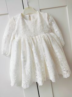 ♡ MADE OF: Ecru delicate fabric with ecru embroidered lace. The lining is made of 100% cotton. ♡ Processing time: 7-10 business days ♡ CARE INSTRUCTIONS: Wash in cold or warm water (30oC/ 65 - 85F). Do not use bleach. Dry at low temperatures, do not use machine drying. Iron at medium or low temperature. Hand wash and hang dry for longer wear. Lace First Communion Dress With Ruffles For Ceremony, Cream Princess Dress With Lace Trim For Baptism, First Communion Princess Dress With Lace Trim, Lace Princess Dress With Ruffles For First Communion, Lace Long Sleeve First Communion Dress, First Communion White Lace Dress With Long Sleeves, White Lace Long Sleeve First Communion Dress, Elegant Baptism Princess Dress With Lace Trim, Spring Lace Patchwork Dress For Baptism