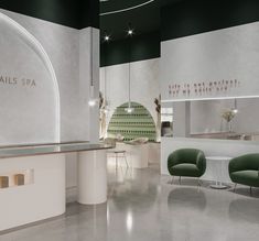 the interior of a salon with green chairs and white counter tops, along with an arched wall