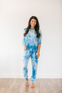 "Tie Dye Jogger Set/Tie Dye Lounge Set MATERIAL: A very soft and stretchy material. This is a lightweight material. 95% Cotton 5% Spandex (Black/White,Blue,Teal) 95% Polyester 5% Spandex (Pink) SIZING: Women's sizes Small, Medium, Large, X-Large **If you want a difference sized top/bottom within your set - I can certainly do that! Just make a note in the \"note to seller\" at checkout** Model is 5'4\", USA size 2, and wearing a size small. Overall Length: Small - 36.5 inches Medium - 37 inches L Cozy Long Sweatpants For Loungewear, Loungewear Sweats With Elastic Waistband, Comfy Cozy Fit Sweats For Loungewear, Blue Relaxed Fit Sleepwear For Loungewear, Super Soft Long Sleeve Sleepwear In Relaxed Fit, Comfy Cotton Sweats For Loungewear, Comfortable Blue Lounging Set, Comfortable Relaxed Fit Sweats For Loungewear, Relaxed Fit Sweats With Elastic Waistband For Loungewear