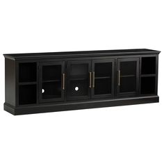 a black entertainment center with glass doors and gold hardware on the bottom, in front of a white background