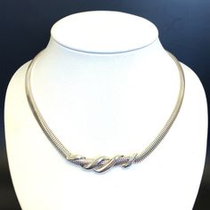 "Fine Silver Flat Snake Chain Necklace with Center Detail- Vintage .999 Silver ~Made in USA - 18.5\" - ET1385 Metal Content: .999 Silver (Fine Silver) Clasp: Lobster Measurements Length:  18.5\"  Width of Chain:  1/4\" (6mm) Weight: 41.31 Grams - this is a heavy chain Marked: .999 USA Condition: Excellent  Each piece is thoroughly examined and refinished as needed by our professional jewelers, tested to guarantee metal content,  graded by our in-house GIA (Gemological Institute of America) Graduate Gemologist, and inspected for quality before being carefully packaged and promptly shipped. Thank you for taking the time to shop with us! We have hundreds of more listings, with more being added every week! From necklaces to bracelets, the classics and trendy.  We are likely to have something y Polished Silver Snake Chain Jewelry, Silver Polished Snake Chain Jewelry, Elegant Polished Snake Chain Necklace, Classic Metal Necklace For Anniversary, Elegant Snake Chain Necklace With Polished Finish, Sterling Silver Snake Chain Necklace With Polished Finish, Classic Sterling Silver Chain Necklace For Anniversary, Silver Snake Chain Jewelry For Anniversary, Classic White Gold Metal Necklaces