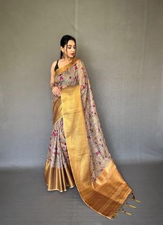 Description:   Embrace tradition with our Pattu Kalamkari saree, featuring a stunning brocade blouse and a contrast pallu adorned with intricate jari weaving.   Experience the luxury of smooth silk, beautifully enhanced by exquisite Kalamkari prints and embossed jari detailing.   The saree boasts a woven border, complemented by a stylish contrast blouse and pallu.   Stunning Kalamkari digital print adds a modern touch to timeless elegance.   Fabrics that speak to your soul   Hurry, book yours today! Luxury Multicolor Kalamkari Print Sets, Navratri Meenakari Tussar Silk Pre-draped Saree, Gold Pre-draped Saree With Cutdana In Jamawar, Festive Tussar Silk Pre-draped Saree With Printed Border, Gold Pre-draped Jamawar Saree With Zari Work, Designer Tussar Silk Pre-draped Saree With Printed Border, Designer Festive Pre-draped Saree With Kalamkari Print, Bollywood Style Pre-draped Saree With Kalamkari Print, Wedding Pre-draped Kalamkari Print Semi-stitched Saree