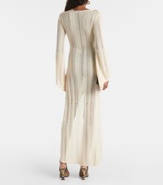 Myda knitted maxi dress in beige - Aya Muse | Mytheresa Chic Knit Maxi Dress For Parties, Stretch Beachwear Dresses For Evening, Elegant Long Beige Maxi Dress, Long Knit Party Dress, Elegant Beige Maxi Dress For The Beach, Elegant Beige Maxi Dress For Beach, Elegant Beige Beach Maxi Dress, Fitted Maxi Beach Dress, Beige Knit Party Dress