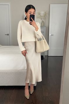 Quince sweater Quince slip skirt songmont bag gucci shoes Cream Silk Skirt Outfit Winter, Cream Satin Midi Skirt Outfit, Beige Slip Skirt Outfit, Champagne Midi Skirt, Long Satin Skirt Outfit Elegant, Satin Champagne Skirt Outfit, Sweater Over Silk Dress, Slip Skirt And Sweater Outfit, Silk Dress And Sweater