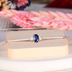 This solid gold, blue sapphire bracelet on our list features a unique design and is a 7x5 mm size blue  coloured, a great birthstone for September It has perfect diamonds on its edges. Contains oval cut blue sapphire. You can use our design bracelet either as an engagement bracelet or daily. A perfect bracelet to receive as a gift. 💎 Gold K: 8K , 14K or 18K Solid Gold 💎 Gram : 2.92 (It may differ depending on the ring size) 💎 Custom Gold Color: Rose Gold, Yellow Gold, White Gold 💎 Round Diam Blue Sapphire Bracelets For Anniversary, Sapphire Round Diamond Bracelet Gift, Oval Sapphire Bracelets For Anniversary, Oval Sapphire Bracelets As Gift, Blue Sapphire Diamond Bracelet Gift, Sapphire Bangle Jewelry Gift, Sapphire Bangle Gift Jewelry, Blue Diamond Bracelet Gift, Gift Sapphire Diamond Bracelet