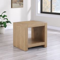 The Lorilynn End Table brings rustic modern style to your living room. Crafted from rich acacia veneers and hardwood solids, it seamlessly blends primitive design with contemporary aesthetics. Its finish beautifully complements a variety of decors. The sturdy squared base provides excellent stability, supporting a thick tabletop for added durability. It enhances the farmhouse vibe, or it can serve as a striking standalone piece beside your chair. This end table combines style and function, makin End Table Wood, Primitive Design, Wood End Table, Living Room End Tables, Wood End Tables, Table Wood, Rustic Modern, Modern Rustic, End Table