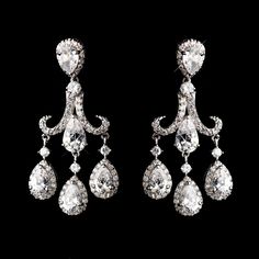 These gorgeous chandelier earrings have a sparkle that can be seen from miles away. Encrusted with delicate CZ gemstones featuring a vintage-style design, these beautiful earrings are a lovely accessory for the bride, her bridesmaids or even the prom queen in need of some extra glitz. Size: 2'' x 1'' Vintage Wedding Accessories, Bridal Dangle Earrings, Modern Vintage Wedding, Vintage Glam Wedding, Formal Earrings, Silver Headband, Nouveau Jewelry, Edwardian Style, Earrings Antique