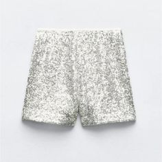 New With Tag Zara 2024 Collection Shorts With A High Waist With Interior Lining. Sequin Appliqus. Side Zip Closure. Silver | 2872/482 Outer Shell 99% Polyester 1% Elastane Lining 100% Polyester Which Has At Least Lining 100% Rcs-Certified Recycled Polyester Party Pants With Built-in Shorts, Glamorous High-waisted Summer Shorts, Glamorous Summer Shorts, Glamorous Sequined Bottoms For Summer, Glamorous Spring Shorts, Summer Party Pants With Built-in Shorts, Chic Sequined Shorts For Spring, Chic Sequin Party Shorts, High-waisted Sequin Shorts For Summer