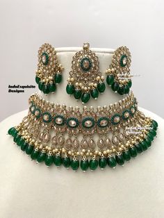 Antique Gold Polki Necklace Set comes with Stud earrings and tikka / Indian Jewelry/ High Quality Kundan and Polki Jewelry/ Bollywood Jewelry/Wedding Jewelry/Green   All items are shipped from Brampton, Ontario, Canada. If you need your item by a certain day, please reach out to us for express delivery option before placing the order so that we can update the shipping for you. Standard shipping/delivery timeline Below are the delivery timeline estimates once the order ia shipped ---> USA delivery timeline * 3-5 business days to major urban centers in USA. It may take 1-2 days extra to remote locations ---> Canada delivery timeline  * 2-3 business days - GTA  & Montreal  * 2-4  business days - Rest of Ontario/Quebec * 3-6 business days-  Rest of Canada    ---> Europe/Middle East timeline * Green Chandbali Tikka For Festive Occasions, Festive Green Chandbali Tikka, Green Chandbali Tikka For Celebration, Festive Heavy Green Tikka, Bollywood Green Tikka For Festive Occasions, Green Bollywood Tikka For Festive Occasions, Green Bollywood Style Tikka For Festive Occasions, Festive Green Bollywood Tikka, Festive Green Tikka For Festivals