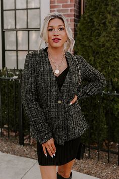 Take your girl boss wardrobe to the next level with our black designer inspired 'Dreaming Bigger' blazer featuring luxe tweed material, long sleeves, low accent pockets with flap closures, and a flattering silhouette that ends in a straight hemline! Measurements S : Bust 38", Hip 38", Length 26.5", Sleeve Length 24.5", Waist 34". M : Bust 40", Hip 40", Length 27", Sleeve Length 24.5", Waist 36". L : Bust 42", Hip 42", Length 28", Sleeve Length 25", Waist 38". Black Tweed Blazer With Notch Lapel, Tweed Blazer With Lapel Collar For Office, Office Tweed Blazer With Lapel Collar, Office Tweed Blazer With Notch Lapel, Single Breasted Tweed Blazer For Work, Elegant Black Tweed Jacket With Lapel Collar, Formal Black Tweed Blazer, Black Notch Lapel Tweed Jacket For Winter, Black Tweed Jacket For Business In Fall