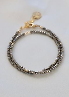 Petite Metallic Crystal Double Wrap Bracelet with Gold Accents - Small metallic crystal beads with gold accents and tassel ending. - Measures an adjustable 13.5-14.5" Crystal Wrap, Double Wrap Bracelet, Gold Accents, Crystal Beads, Wrap Bracelet, Gold Metal, Vintage Jewelry, Gold Bracelet, Beaded Bracelets