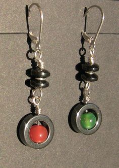 Complements the Festive Hematite Circle necklace: https://www.etsy.com/listing/124795248/festive-hematite-circle-necklace Type:  Hinged pierced leverback earhooks Length: 48 mm (just under 2 in) Beads: Hematite, orange agate, green agate, sterling silver Findings: Sterling silver        Complementary bracelet sold separately: https://www.etsy.com/listing/124795589/festive-hematite-circle-bracelet (Use coupon code Set68 to receive 5% off when purchasing a necklace, bracelet, and/or earring and set.) Spiritual Hematite Round Bead Jewelry, Adjustable Hematite Jewelry With Round Beads, Round Beaded Hematite Jewelry, Silver Hematite Jewelry With 8mm Beads, Adjustable Round Hematite Jewelry, Circle Bracelet, Orange Agate, Green Agate, Circle Necklace