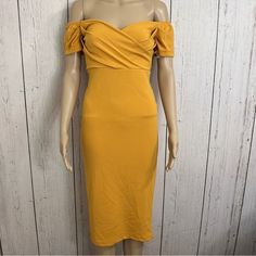 Nwt Topshop Bodycon Dress New With Tags. Off The Shoulder. Bodycon. Golden Color. Hidden Rear Zipper. Faux Wrap Bodice. Capped Sleeves With Elastic For Off The Shoulder Support. Polyester/Spandex Blend. Size 4. Beautiful! *Small Snag In Front As Pictured. Nwt, Never Worn Shipped Quickly From A Smoke And Pet Free Environment. Yellow Off-shoulder Midi Dress For Brunch, Yellow Knee-length Mini Dress For Date Night, Yellow Sheath Dress For Date Night, Yellow Fitted Midi-length Dress, Yellow Off-shoulder Brunch Dress, Yellow Bodycon Dress With Short Sleeves, Yellow Knee-length Midi Dress For Night Out, Yellow Off-shoulder Dress For Brunch, Yellow Sheath Mini Dress For Night Out