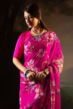 Hot pink saree featuring floral print with contrast blue piping on the hem. Comes with an unstitched blouse piece. - Aza Fashions Georgette Blouse With Printed Motifs, Designer Wear Blouse With Printed Motifs, Navratri Printed Pre-draped Saree, Silk Choli With Printed Motifs, Elegant Blouse Piece With Printed Motifs, Elegant Blouse Piece With Printed Motifs For Navratri, Elegant Printed Blouse Piece For Navratri, Designer Wear Blouse Piece With Printed Motifs For Diwali, Traditional Georgette Blouse Piece With Printed Motifs