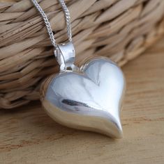 This is 925 sterling silver high polish heart pendant.     925 stamped. Approx. measures:         total length:  29mm        without bail: 23mm        width: 23mm        thick : 12mm Approx. weight:  5.2 grams. Available on it's own or with various length (16-30 Inch ) 1mm curb chain, please choose from the drop down menu at the top of the page.   Presented in gift box.   Thank you for looking! Bear Claw Necklace, Claw Necklace, Silver Dragon Necklace, Pretty Jewelry Necklaces, Horn Jewelry, Sterling Silver Heart Pendant, Medieval Jewelry, Dragon Jewelry, Puffed Heart