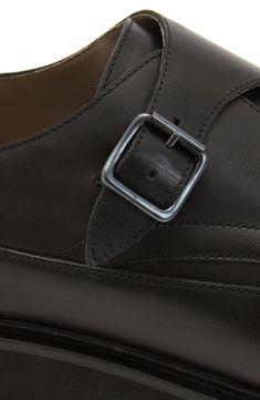 Neat stitching enhances the clean lines of a smooth leather monk-strap shoe grounded by a durable rubber sole. Leather upper and lining/rubber sole Made in Portugal Business Leather Slip-on Shoes With Tang Buckle, Leather Slip-on Monk Strap Shoes With Stitched Sole, Leather Monk Strap Shoes With Stitched Sole, Leather Monk Strap Shoes With Brogue Detailing, Business Monk Strap Shoes With Stitched Sole, Luxury Monk Strap Shoes With Stitched Sole, Leather Monk Strap Shoes, Business Casual Slip-on Monk Strap Shoes With Leather Lining, Leather Monk Strap Shoes With Rubber Sole