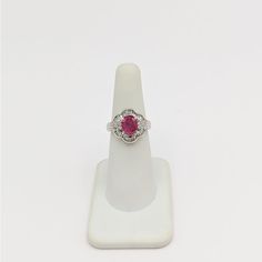 Beautiful 2.23 ct. ruby oval with 0.41 ct. good quality white diamond baguettes and rounds.  Handmade in platinum.  Ring size 5.25.  Metal: Platinum Stone: White Diamond,Ruby Stone Cut: Oval Cut  Dimensions reference the ring size and are not specific to the ring itself. Exact ring dimensions are not provided. Please reach in the seller Q&A for questions. Oval Ruby Ring With Diamond Center Stone, Classic White Oval Ruby Ring, Oval Lab-created Ruby Diamond Ring In White Gold, Oval Diamond Ring With Lab-created Ruby Accents, White Oval Ruby Ring, Oval White Ruby Ring, Oval Ruby Ring With Platinum Center Stone, Oval Ruby Ring With Platinum Band, Oval Ruby Ring With Platinum Setting