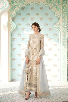 Luxury Party Wear in Ivory Color in Stylish design presented with beautiful embroidery work and looking unique. Buy luxury party wear online in USA. Cream Semi-stitched Gown For Eid, Elegant Party Lehenga With Naqshi Details, Cream Eid Gown With Dupatta, Cream Gown With Dupatta For Eid, Elegant Beige Salwar Kameez For Reception, Elegant Off-white Floor-length Salwar Kameez, Semi-stitched Naqshi Lehenga For Party, Anarkali Style Party Lehenga With Naqshi Details, Anarkali Lehenga With Naqshi For Party