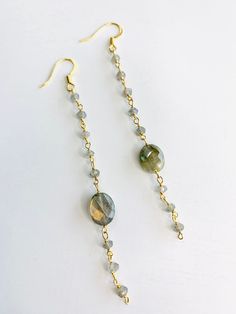 Sparkly Labradorite Earrings.  High quality Labradorite stones.  Fabulous gift.  Labradorite is known to be useful through change, especially when strength and perseverance are needed.  These beautiful earrings will not disappoint.  They make a great gift! Gold Labradorite Earrings With Natural Stones, Wire Wrapped Labradorite Dangle Earrings, Gold Wire Wrapped Labradorite Earrings, Gold Labradorite Wire Wrapped Earrings, Wire Wrapped Labradorite Drop Earrings, Labradorite Wire Wrapped Drop Earrings, Wire Wrapped Labradorite Earrings For Jewelry Making, Nickel-free Labradorite Earrings For Jewelry Making, Handmade Long Drop Labradorite Earrings