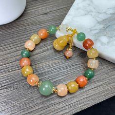 🌅Jade bead bracelet: Also called the buddha bead, symbol the spirit of Buddhism, suitable for the people who believe in Buddhism or have a heart for being kind 🌅Gourd / Hulu (葫蘆): The shape of the gourd resembles the human belly, which is associated with longevity. 🍀JadeousJade: An Etsy StarSeller of natural Jadeite Jade jewelry for your daily mix and match 🌟Item Details: * 100% AUTHENTIC: Grade A untreated natural Jade bracelet * DETAIL HANDCRAFTED: Handcrafted in detail & finely polished * PROPERTY: Bring Protection, Safe and Calm * INNER DIAMETER: 16 cm with elastic string (fits 14-16 wrist) * WEIGHT: 25-30g each (approx.) 💝We hope you can find a piece of jade jewelry that resonates with your mind and soul. Or send someone a gift with meaning and blessing! 🌠Ship from Hong Kong wit Multicolor Jade Spiritual Bracelets, Spiritual Multicolor Jade Bracelets, Beaded Jade Bracelet For Meditation, Jade Beaded Bracelets For Meditation, Jade Beaded Bracelet For Meditation, Multicolor Jade Round Beads Crystal Bracelet, Multicolor Jade Bead Crystal Bracelet, Multicolor Jade Beaded Bracelets, Multicolor Jade Crystal Bracelet With Round Beads