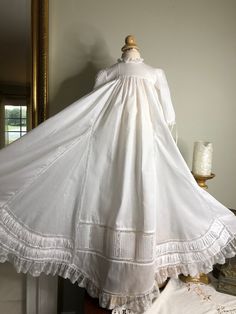 Yards of Swiss batiste make this exquisite gown so lush and over the top French Val laces, puffing, and pintucks on Godets and panels Can add initials for extra fee Classic White Gown With Lace Trim, Victorian White Ball Gown, Victorian White Ball Gown Dress, White Victorian Ball Gown Dresses, White Ball Gown With Lace Trim, Fitted White Gown With Historical Design, White Gown With Historical Design And Fitted Bodice, White Fitted Gown With Historical Design, White Gown With Ruffles And Fitted Bodice