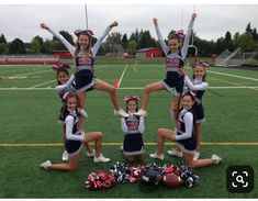 the cheerleaders are posing for a photo on the field