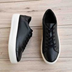 Experience luxury and comfort with these gorgeous Black Genuine Leather Sneakers. Crafted with premium genuine leather, these sneakers feature a high sole that looks stunning and provides unbeatable support. Step into style with these stunning shoes! Luxury High-top Chunky Sneakers With Rubber Sole, Sporty Leather Lace-up Shoes With Textured Sole, Black Sneakers With Vulcanized Sole In Calf Leather, Black Calf Leather Sneakers With Vulcanized Sole, Calf Leather Platform Sneakers With Contrast Sole For Streetwear, Luxury Chunky Sneakers With Contrast Sole And Lace-up, Calf Leather Low-top Lace-up Shoes With Textured Sole, Calf Leather Low-top Platform Sneakers For Streetwear, Luxury Chunky Lace-up Sneakers With Contrast Sole