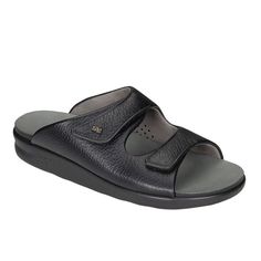 Product Description: Get plush customizable comfort with this slip-on sandal for men. Genuine tumbled leather with soft, padded lining wraps the foot in cushioning. A broad contoured insole covered in Super Suede supports the natural arch of the foot. Adjustable straps offer a customized fit that can easily be changed throughout the day. Heel Height: 1.50". Product Details: Initial fit should allow the foot to settle naturally into the sandal. The front straps should lay comfortably over the for Comfortable Slides With Ortholite Insole And Round Toe, Black Slip-on Footbed Sandals With Ortholite Insole, Classic Open Toe Slippers With Leather Footbed, Comfortable Slide Sport Sandals With Removable Insole, Comfortable Closed Toe Slip-on Slides, Comfortable Slip-on Closed Toe Slides, Comfortable Leather Sole Slide Sandals, Classic Slip-on Slides With Removable Insole, Comfortable Slides With Leather Sole And Single Toe Strap