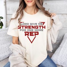 Lord Give Me Strength One More Rep TShirt Lifting Shirt Christian Gym Workout Shirt Bodybuilding T-Shirt Gift for Men or Women Exercise Gift Welcome to Built Temple! We are a faith based design shop that has a variety of affordable and comfortable products with the intention to lift your spirits and your days.  Fit - Classic unisex t-shirt  - Ribbed knit collars to bolster shaping  - Shoulders are tapered for a better fit over time - Dual side seams hold the garment's shape for longer Sizing/Colors - Small to 3XL - See Images for sizing and color options - For best fit, lay out a favorite shirt at home, measure, and compare to the sizing chart found in the listing images. Material - Fabric blends: Ash - 99% Airlume combed and ring-spun cotton, 1% polyester Heather colors and Solid Black Bl Affordable Ribbed Gym Tops, Lord Give Me Strength, Christian Gym, Women Exercise, Bodybuilding T Shirts, Give Me Strength, Fitness Gifts, Faith Based, Christian Shirts