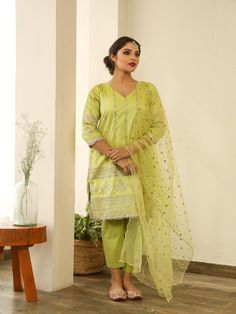 Beautiful Kurta set made in cotton silk. It has glorious golden embroidery all over paired with handcrafted organza dupatta. Color: Pistachio Green Fabric: Cotton Silk and Organza Note: Length and sizes can be customised Length - Kurta 40 inches Pants 38 inches Available in other colors If you happen to see some deformity in hand-work or fabric, that’s mere the technique of the same and not a defect. The garment is quite premium. The product will be delivered within 20-25 days of order placed Wa Silk Kurta Set, Golden Embroidery, Silk Kurta, Pistachio Green, Organza Dupatta, Hand Work, Kurta Set, Green Fabric, Cotton Silk