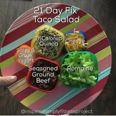 a plate with different types of food on it and the words 21 day fix taco salad