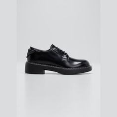 Prada derby loafers in calf leather 2.00 in / 50 mm flatform heel Almond toe Lace-up vamp Logo triangle at back  Leather/rubber outsole Made in Italy Modern Platform Loafers With Brogue Detailing For Business, Elegant Slip-on Oxfords With Contrast Sole, Elegant Business Loafers With Contrast Sole, Luxury Platform Loafers With Rubber Sole For Formal Use, Luxury Formal Platform Loafers With Rubber Sole, Luxury Platform Loafers With Rubber Sole For Formal Occasions, Classic Formal Platform Loafers With Contrast Sole, Classic Platform Loafers With Contrast Sole For Office, Modern Formal Platform Loafers With Contrast Sole