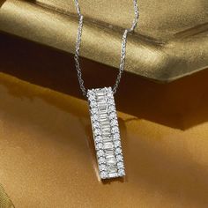 Ross-Simons - 1.00ct t. w. Round, Baguette Diamond Bar Pendant Necklace. 18". A diamond bar necklace is a classic, heirloom-worthy look. Here, a vertical runway of baguette diamonds is trimmed on either side by round brilliant-cut diamonds, totaling 1.00 carat. Crafted in 14kt white gold. Suspends from a rope chain. Springring clasp, diamond bar necklace. Diamond birthstones are the perfect gift for April birthdays. Baguette Necklace Diamond, Baguette Necklace, Diamond Bar Necklace, Bar Pendant Necklace, Diamond Birthstone, Necklace Diamond, Baguette Diamonds, Diamond Bar, Bar Pendant