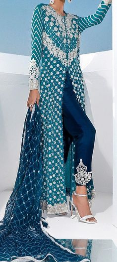 Product Description:  Teal Outfit with embellishment Color: Cobalt Blue Includes:  Tunic - Georgette Chiffon Pant - Viscose Silk Duppata - Chiffon Elegant Traditional Drape Pants For Eid, Elegant Festive Designer Bottoms, Elegant Designer Pants With Traditional Drape, Elegant Bottoms With Zari Work For Eid, Elegant Silk Bottoms For Eid, Elegant Silk Pants With Zari Work, Elegant Silk Bottoms With Resham Embroidery, Elegant Silk Bottoms For Festive Season, Elegant Bottoms With Dupatta For Eid